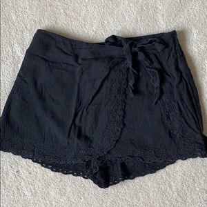 Black cross tie shorts